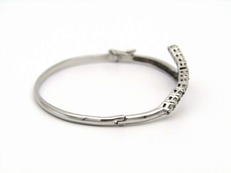 18K gold diamond bangle.