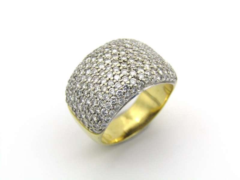 18K gold diamond dress ring by Jenna Clifford.