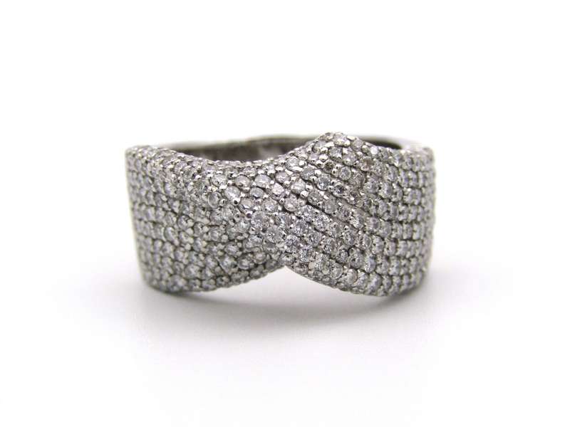 18K gold diamond twist ring.