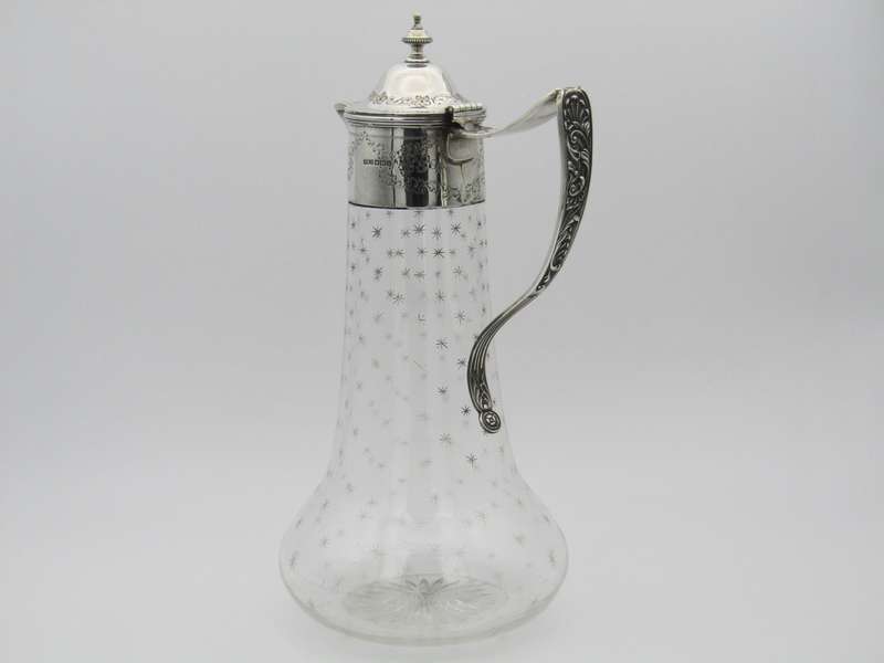 Sterling silver mounted cut glass claret jug by Thomas Henry Blake, Sheffield 1913.