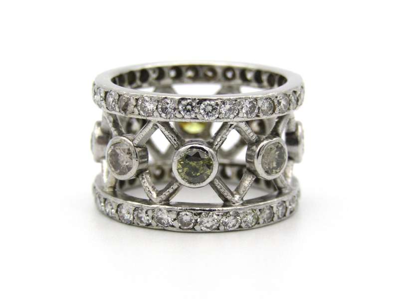 9K gold fancy-coloured and colourless diamond ring.