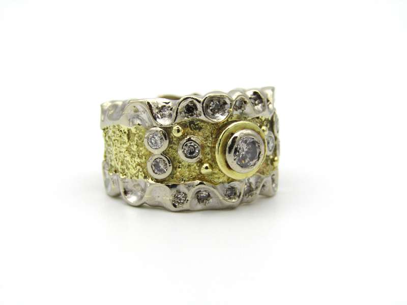 18K gold diamond ring.
