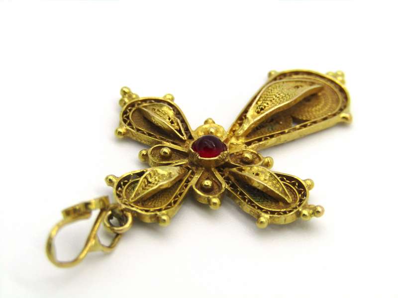 18kt gold filigree ruby cross, Circa 1940.