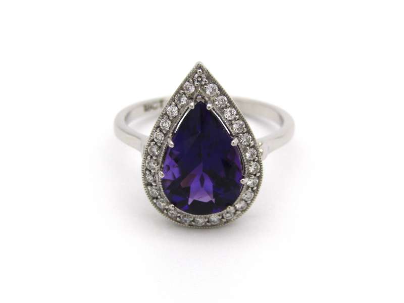 18K gold amethyst and diamond ring.