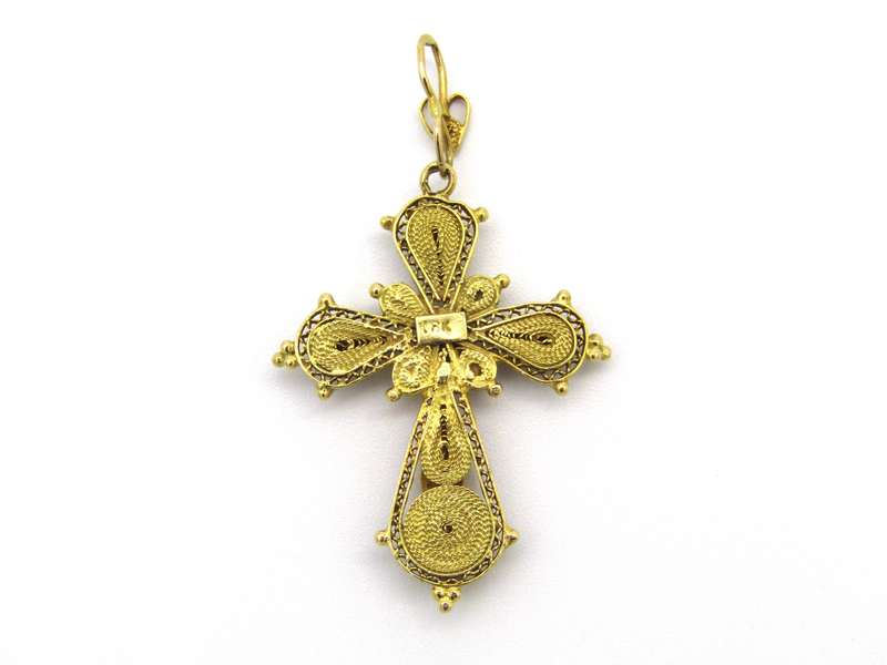 18kt gold filigree ruby cross, Circa 1940.