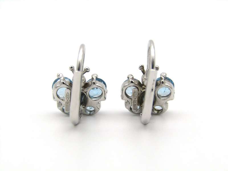 18K gold blue topaz butterfly earrings.