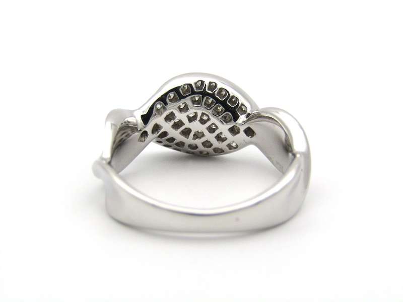 18K gold twist diamond ring.