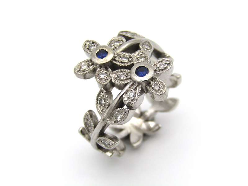18K gold sapphire and diamond ring.