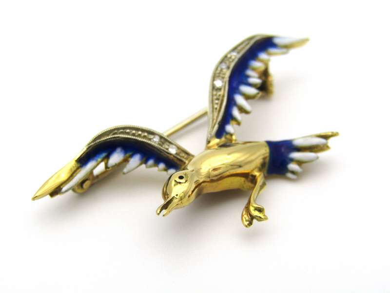 18K gold diamond and enamel "Bird in flight" brooch.