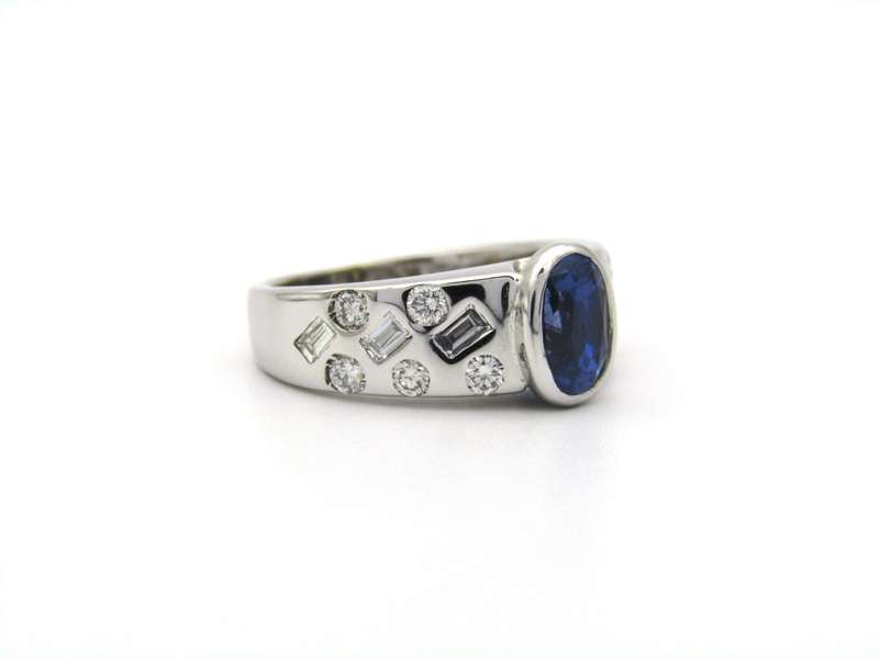 18K gold sapphire and diamond ring.