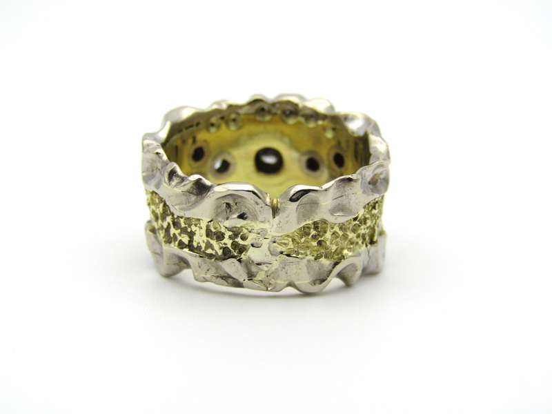 18K gold diamond ring.