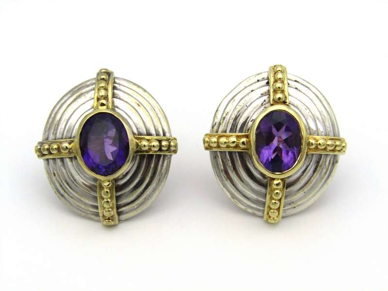A pair of 18K and 9K gold amethyst earrings.