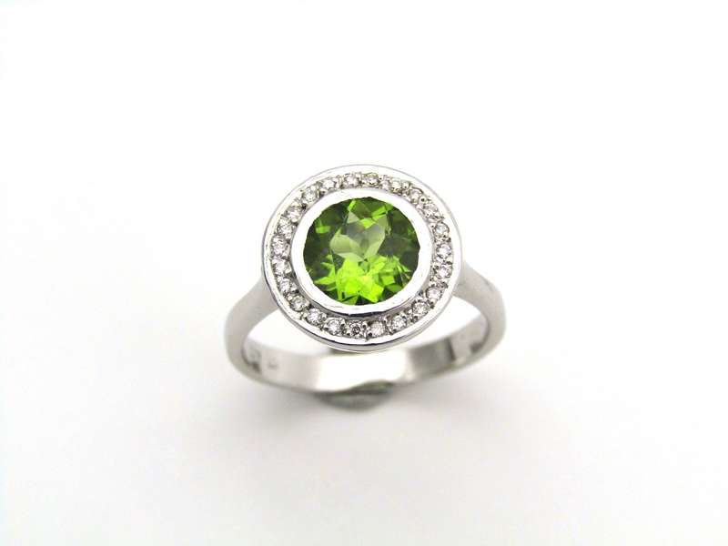 9K gold peridot and diamond ring.