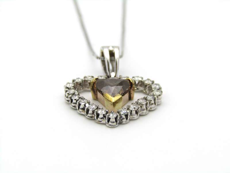18K gold Champagne diamond pendant.