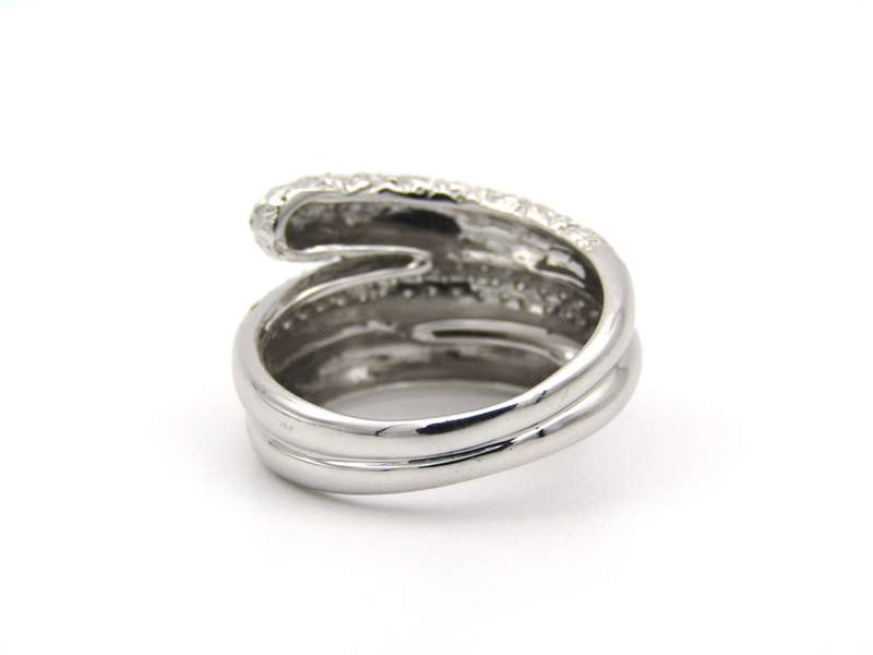 9K gold diamond swirl ring.