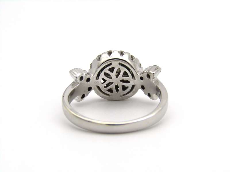 18K gold diamond ring.