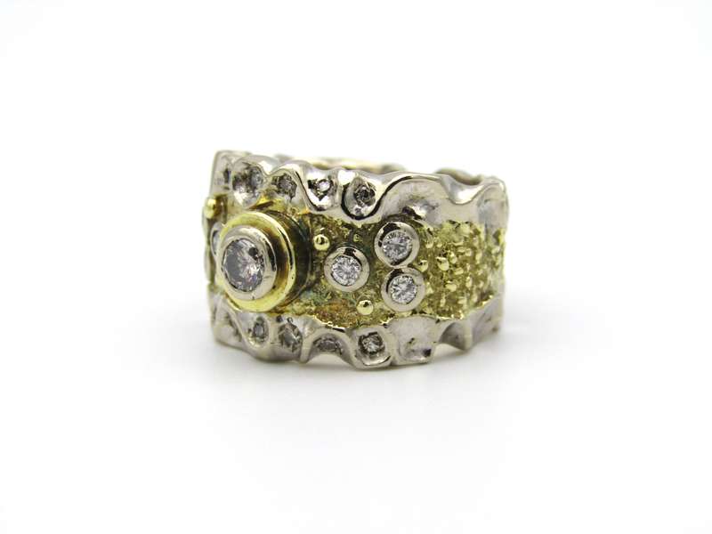 18K gold diamond ring.