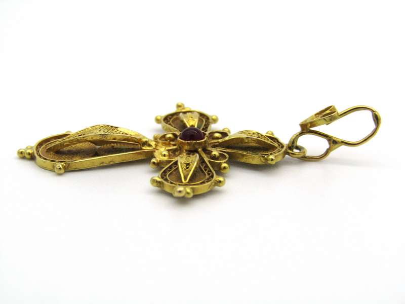 18kt gold filigree ruby cross, Circa 1940.