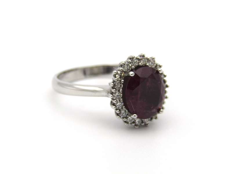 14K gold rubellite and diamond ring.