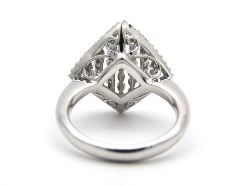 18K gold diamond ring.