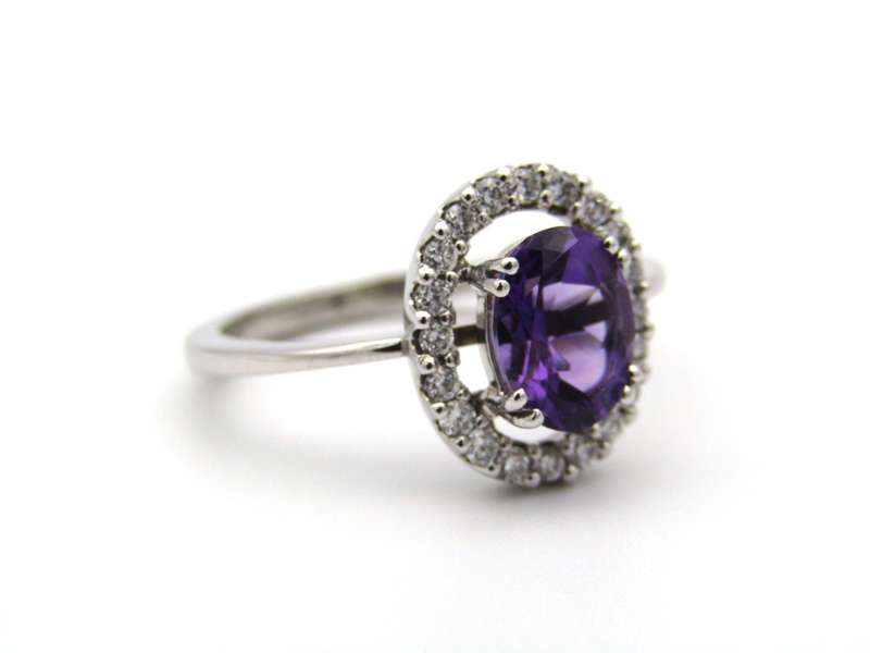 18K gold amethyst and diamond ring.