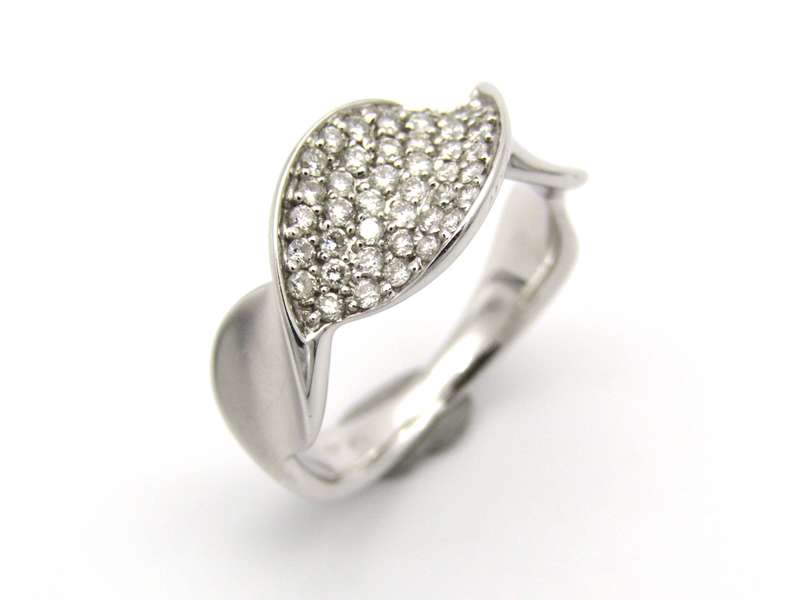 18K gold twist diamond ring.