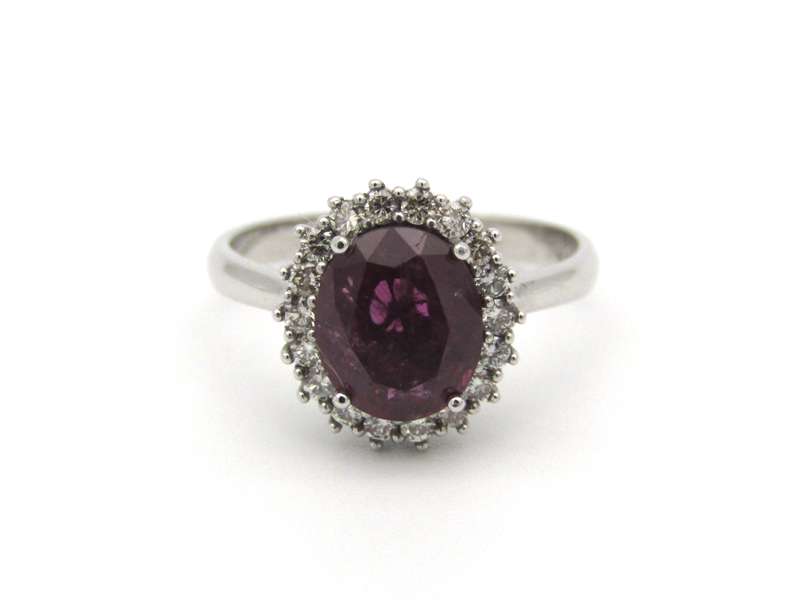 14K gold rubellite and diamond ring.
