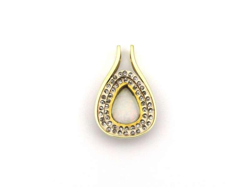 18K gold opal and diamond pendant.