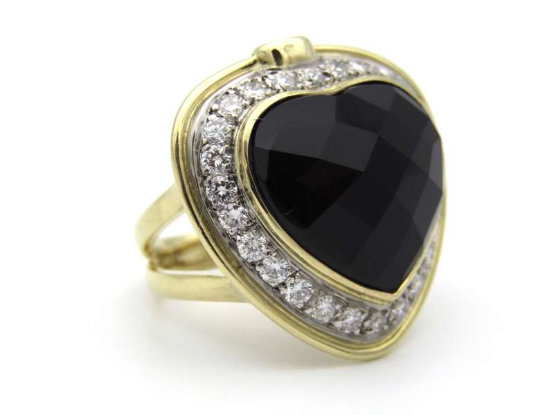 18K gold amethyst, diamond, and ruby ring.