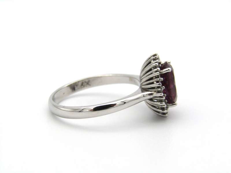 14K gold rubellite and diamond ring.