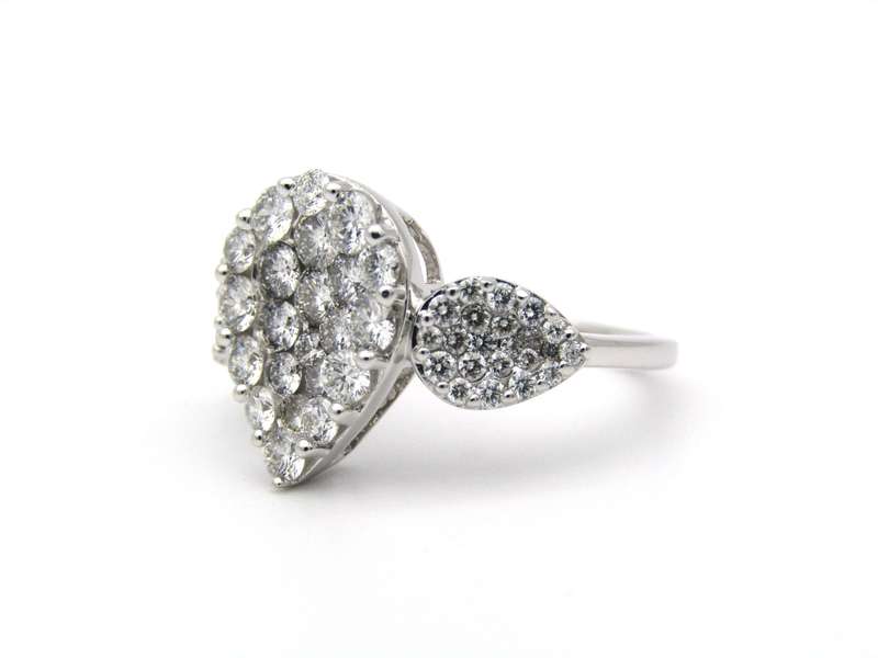 18K gold diamond cluster ring.