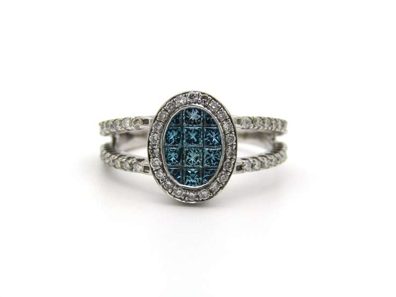 18K gold blue and colourless diamond ring.