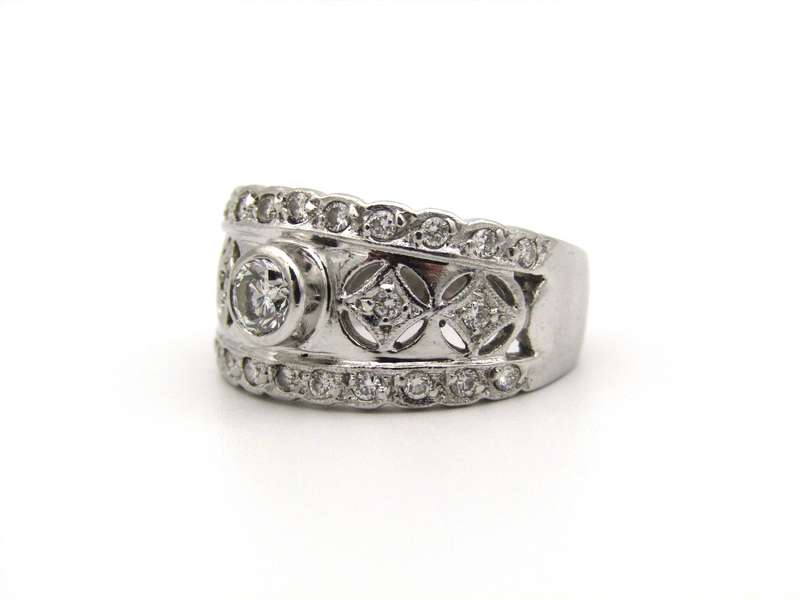 18K gold diamond ring by Jenna Clifford.