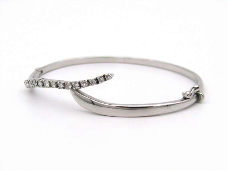 18K gold diamond bangle.