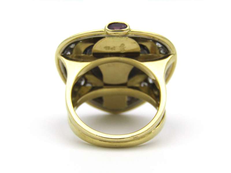 18K gold amethyst, diamond, and ruby ring.