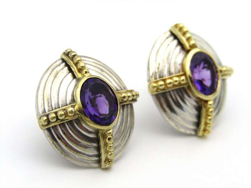 A pair of 18K and 9K gold amethyst earrings.