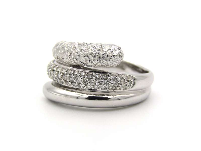 9K gold diamond swirl ring.