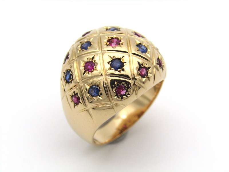 18K gold ruby and sapphire bombe ring.