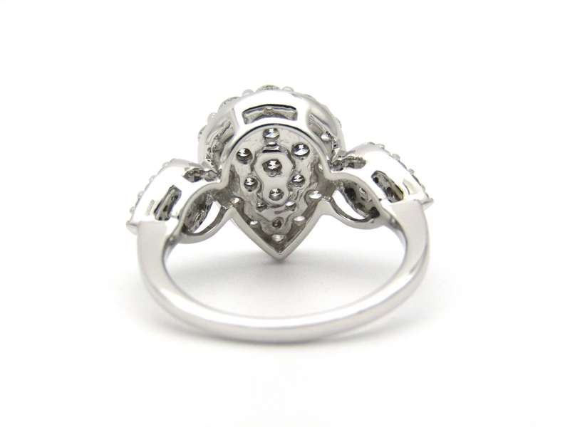 18K gold diamond cluster ring.