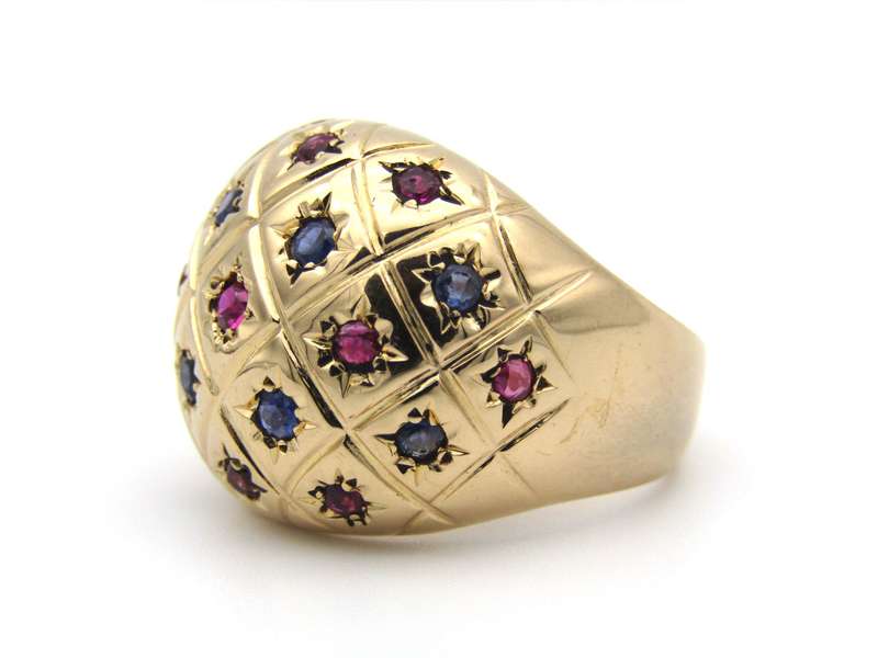 18K gold ruby and sapphire bombe ring.