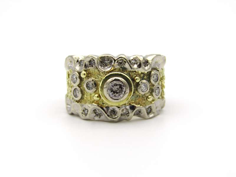 18K gold diamond ring.