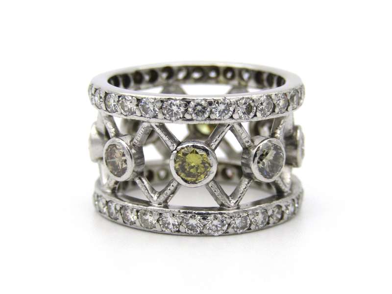 9K gold fancy-coloured and colourless diamond ring.