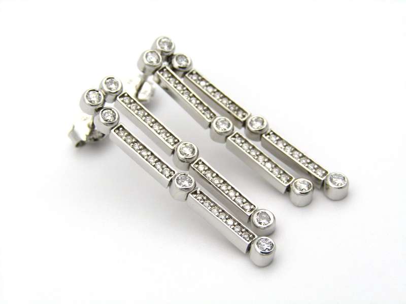 18K gold diamond drop earrings.