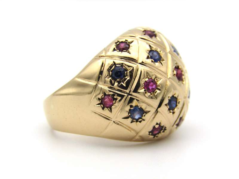 18K gold ruby and sapphire bombe ring.