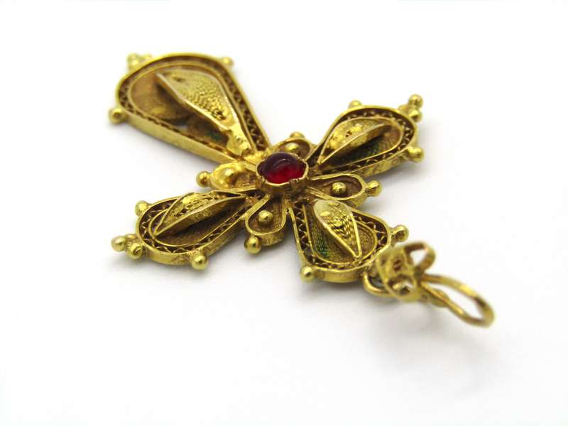 18kt gold filigree ruby cross, Circa 1940.