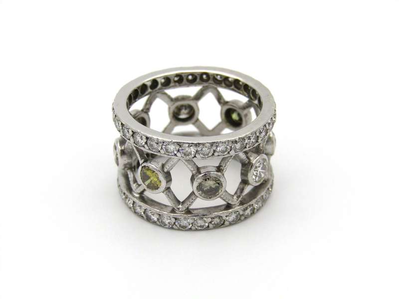 9K gold fancy-coloured and colourless diamond ring.
