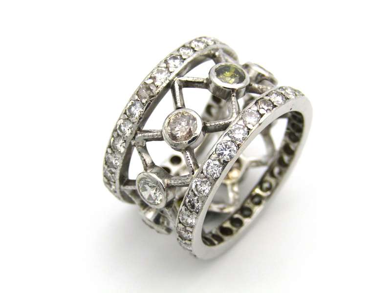 9K gold fancy-coloured and colourless diamond ring.