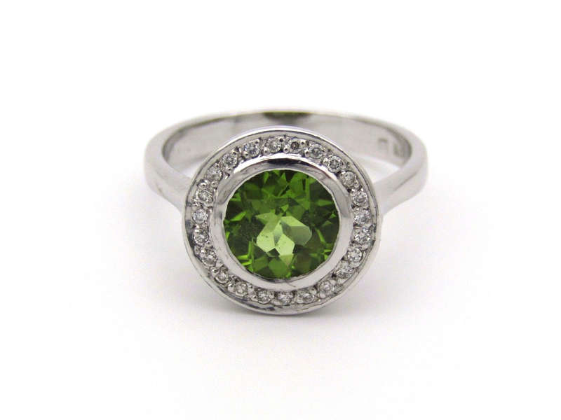 9K gold peridot and diamond ring.