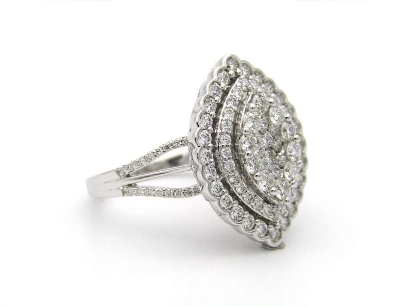 18K gold diamond cluster ring.