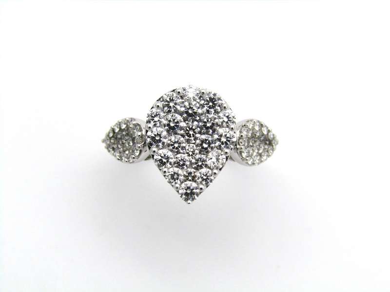 18K gold diamond cluster ring.